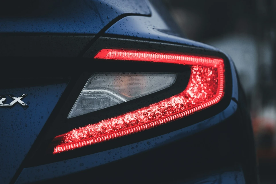 a close up of the tail light of a car